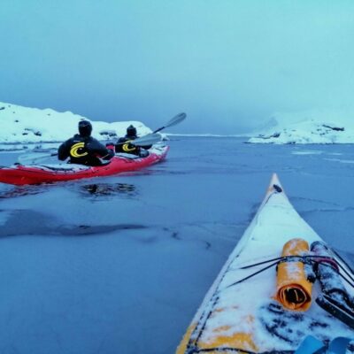 Kayaking on snow in Eggum, Lofoten, Norway